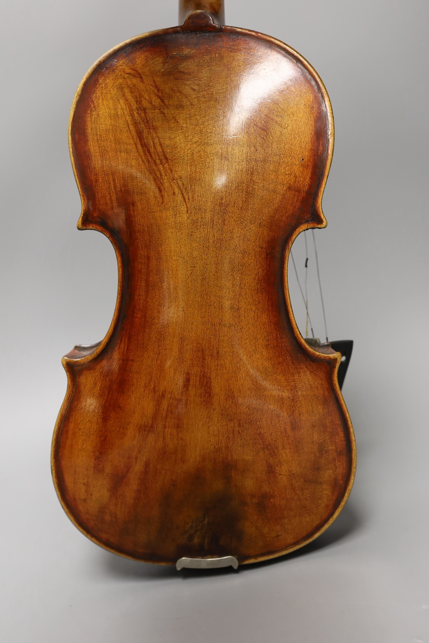 A violin labelled 'Albani Palermo', cased, length of back 35.5cm